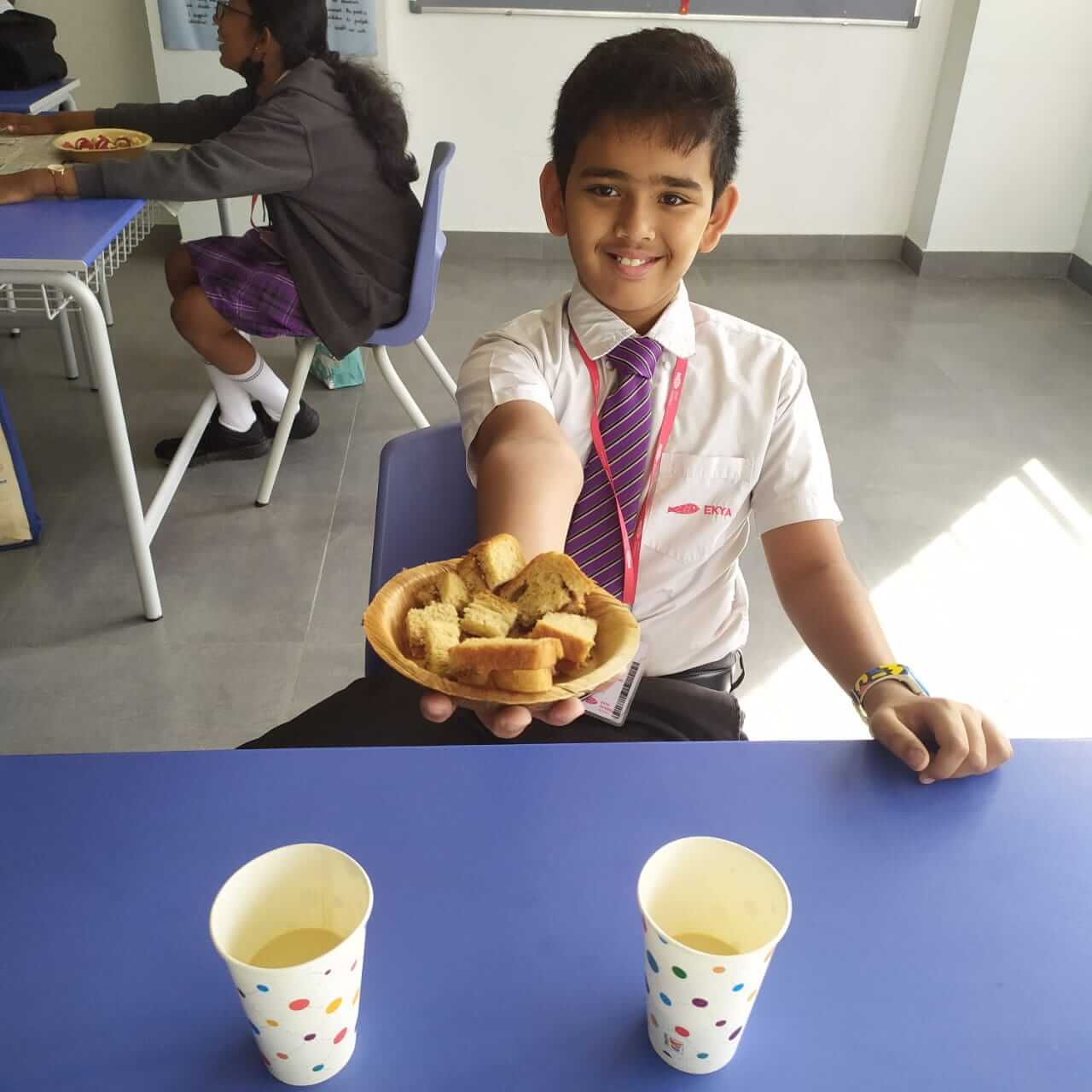 Ekya which is the best school in bangalore Student having breakfast