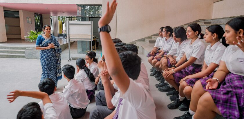 Ekya School students learning with teacher