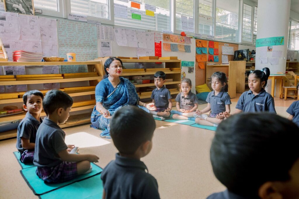 Ekya popular k12 icse schools in bangalore Students and teacher doing yoga