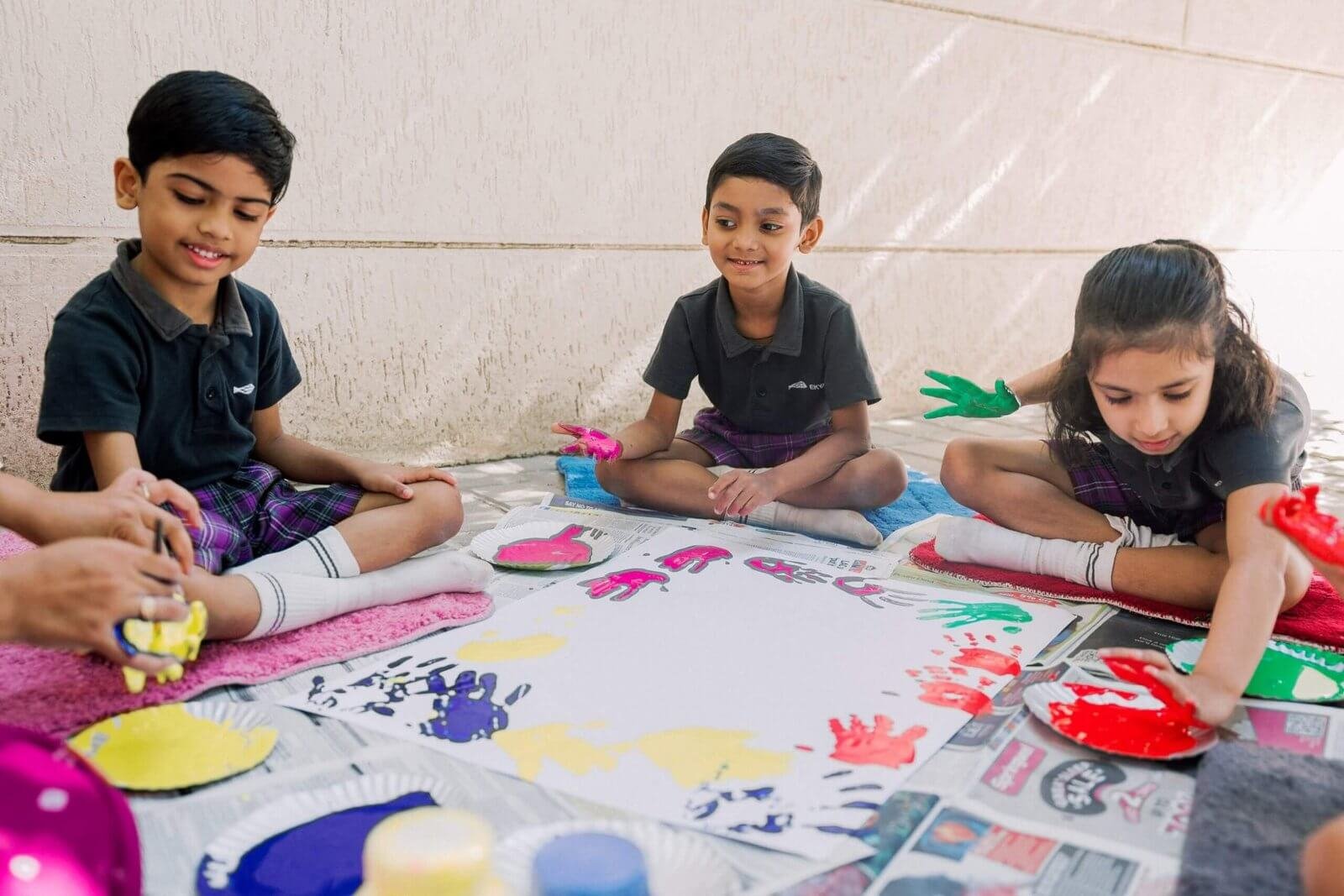 Ekya banglore schools Kids Playing with Colors