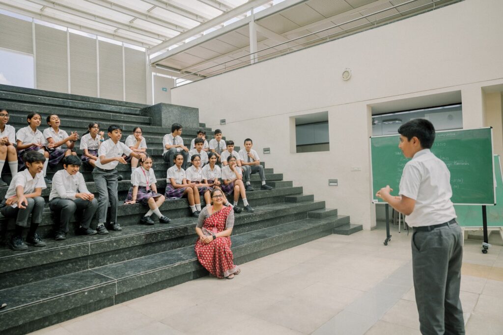 Ekya school Senior students interacting with teacher