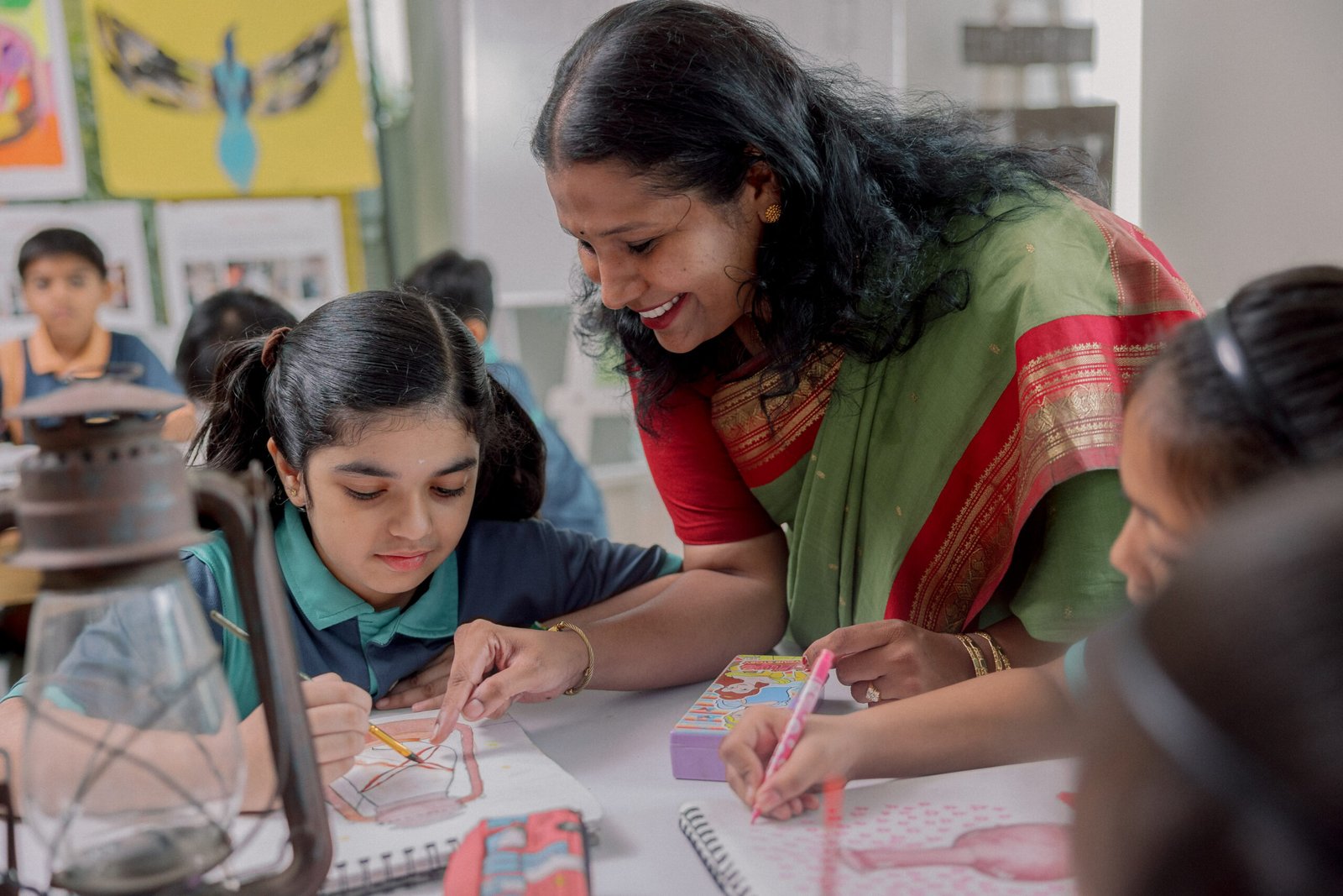 Ekya School Student With Teacher in drawing class