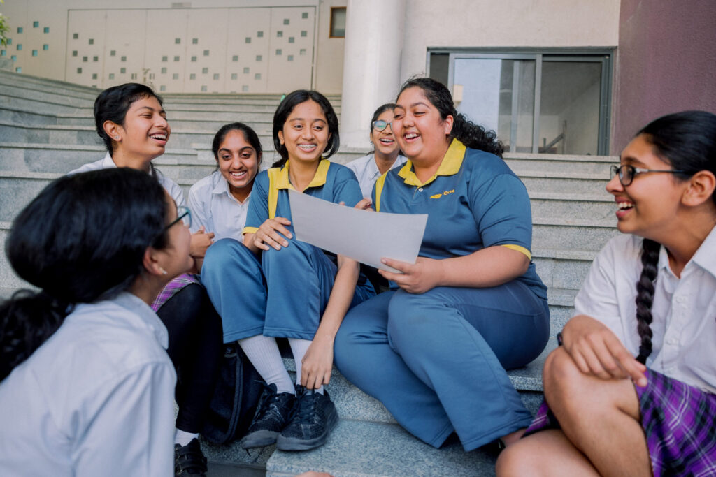 Ekya School Students Laughing while reading