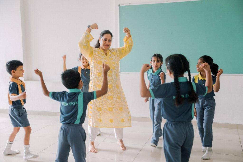 Ekya school teachers playing with students