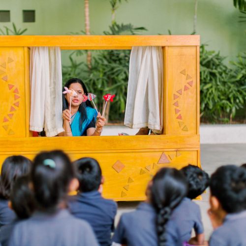 Ekya School Teacher with Students