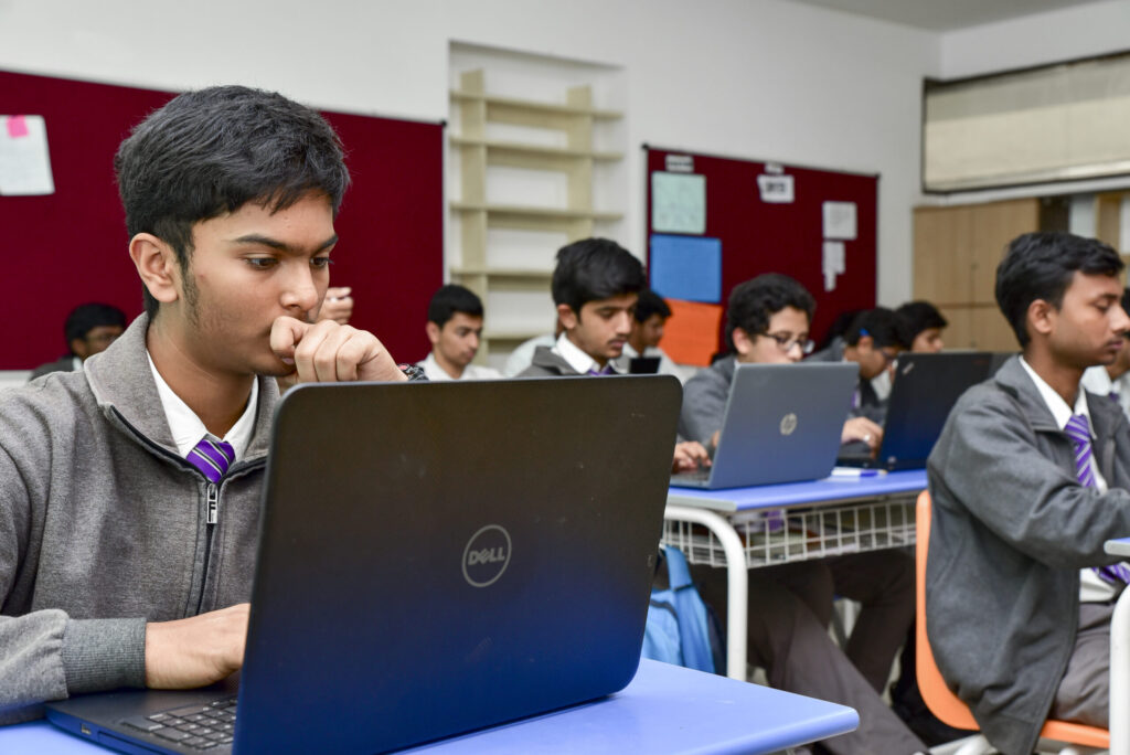 ekya school student in front of laptop